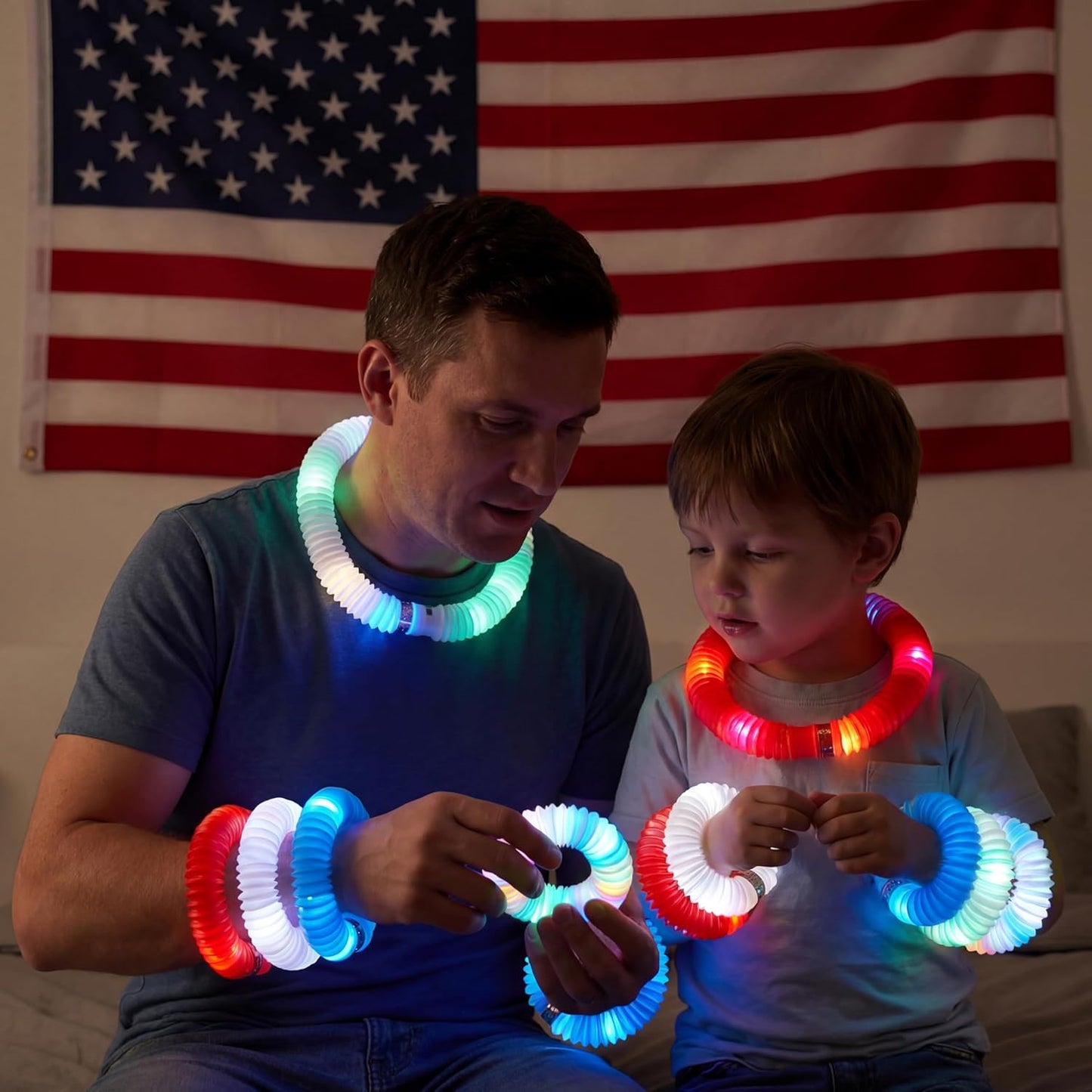 JOYIN 12 PCS 4th of July Red White Blue Glow Sticks & Light Up Pop Tubes, Patriotic Glow Toys Light up Bracelet Necklace, Independence Day Party Favors Supplies for Parade, Camp Games & Activities