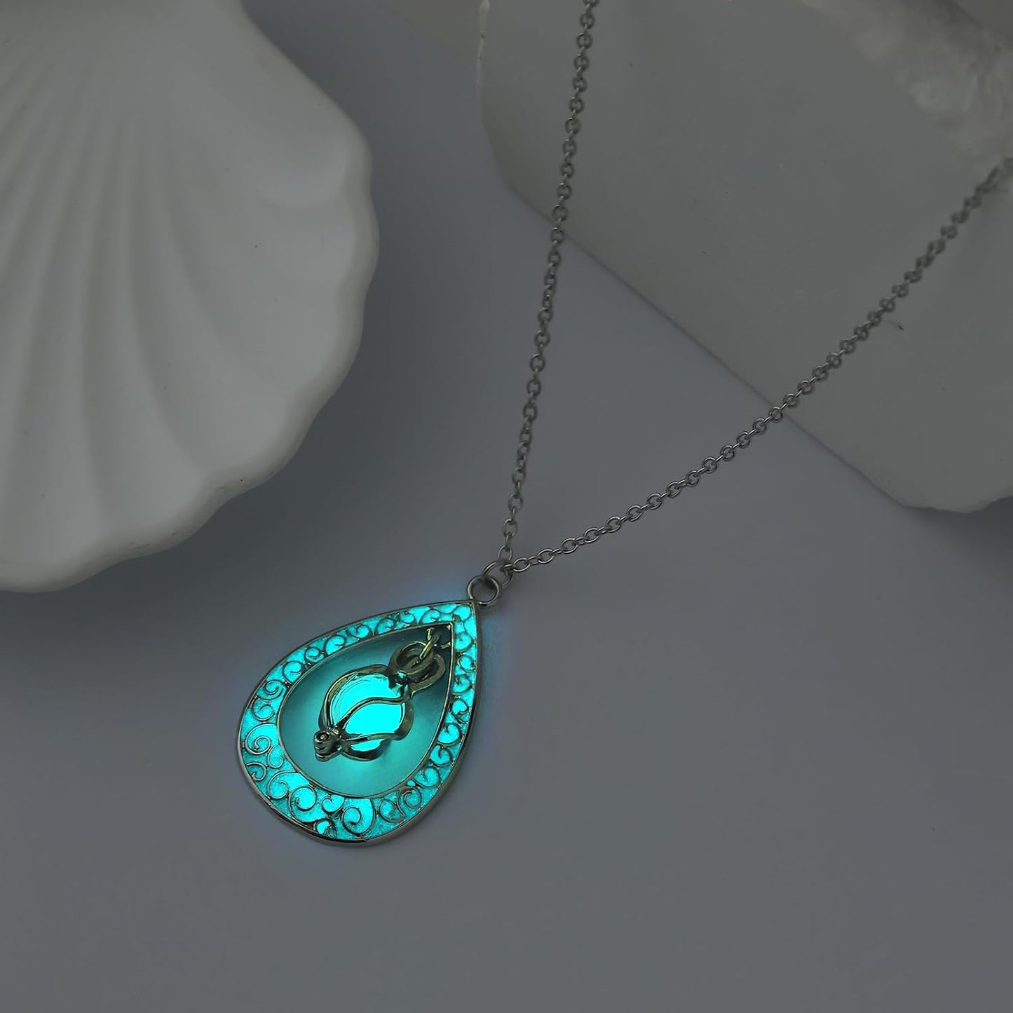 EEQQBZ Glow in The Dark Silver Teardrop shape necklace,Fantasy Glowing Jewelry Charm