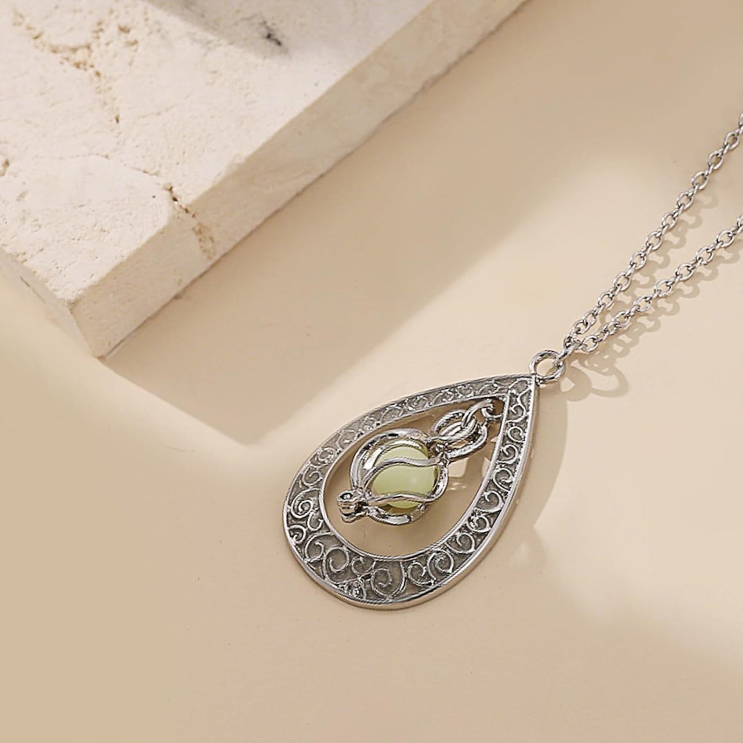 EEQQBZ Glow in The Dark Silver Teardrop shape necklace,Fantasy Glowing Jewelry Charm
