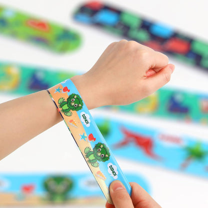 DERAYEE 24 Pcs Dinosaur Slap Bracelets for Kids, Jurassic Forest World theme Snap Bands Toy Gift Party Favor Supplies for Dino Party Bag
