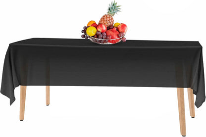 14 Pack Black 54 x 108 in. Rectangle Disposable Plastic Tablecloths - Smooth Decorative Covers for Parties, Weddings
