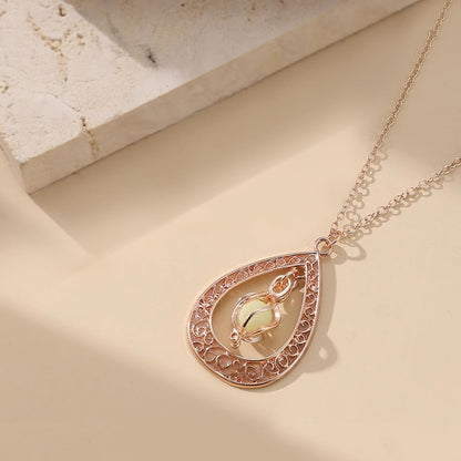 EEQQBZ Glow in The Dark Silver Teardrop shape necklace,Fantasy Glowing Jewelry Charm
