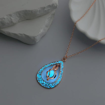 EEQQBZ Glow in The Dark Silver Teardrop shape necklace,Fantasy Glowing Jewelry Charm