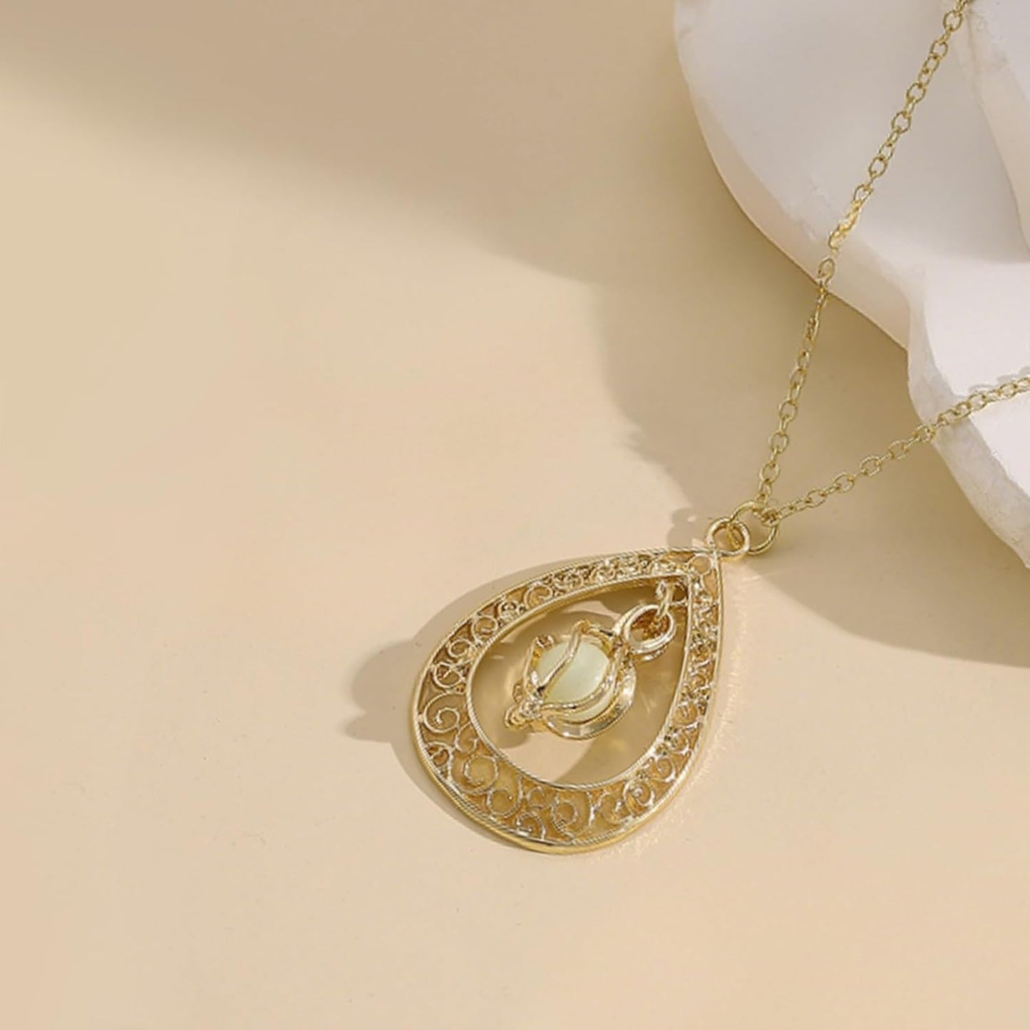 EEQQBZ Glow in The Dark Silver Teardrop shape necklace,Fantasy Glowing Jewelry Charm