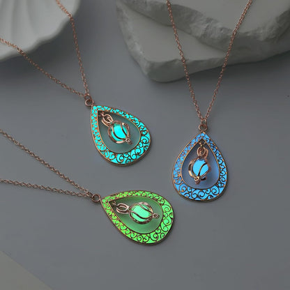 EEQQBZ Glow in The Dark Silver Teardrop shape necklace,Fantasy Glowing Jewelry Charm