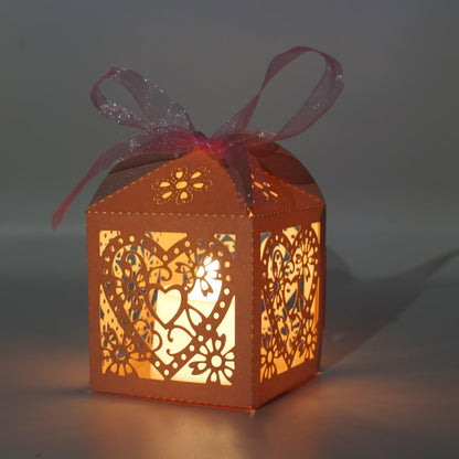 KPOSIYA 100 Pack Love Heart Laser Cut Wedding Party Favor Box Candy Bag Chocolate Gift Boxes Bridal Birthday Shower Bomboniere with Ribbons