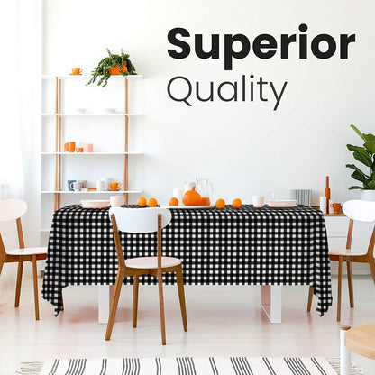 14 Pack Black 54 x 108 in. Rectangle Disposable Plastic Tablecloths - Smooth Decorative Covers for Parties, Weddings