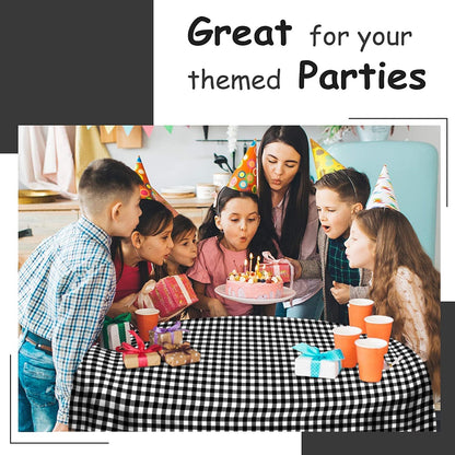 14 Pack Black 54 x 108 in. Rectangle Disposable Plastic Tablecloths - Smooth Decorative Covers for Parties, Weddings